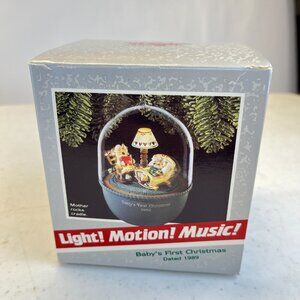 1989 Hallmark Keepsake Baby's First Christmas Ornament Motion Rock Cradle